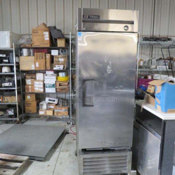 One True 1 Door Freezer With 3 Racks On Casters. Model# T-23F. 115 Volt. Not WORKING. 27X30X83 - Image 1 of 1
