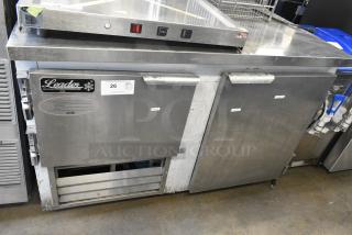 2019 Leader NLB48 Stainless Steel Commercial 2 Door Undercounter Cooler on Commercial Casters. 115 Volts, 1 Phase. Tested and Powers On But Does Not Get Cold