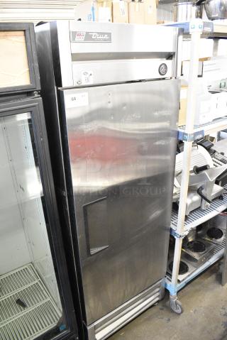 True T-19 Stainless Steel Commercial Single Door Reach In Cooler w/ Poly Coated Racks. 115 Volts, 1 Phase. Tested and Powers On But Does Not Get Cold