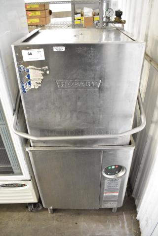 Hobart AM13 Stainless Steel Commercial Straight Pass Through Dishwasher. 208-240 Volts, 3 Phase.