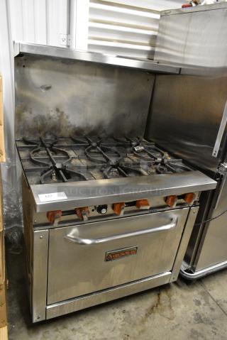 Sierra Stainless Steel Commercial Natural Gas Powered 6 Burner Range w/ Oven, Over Shelf and Back Splash.