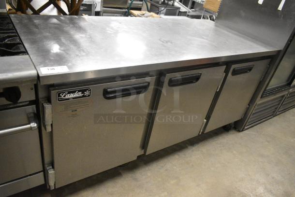 Leader ESLB72S/C Stainless Steel Commercial 3 Door Undercounter Cooler on Commercial Casters. 115 Volts, 1 Phase. Tested and Powers On But Does Not Get Cold - Image 1 of 8