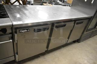 Leader ESLB72S/C Stainless Steel Commercial 3 Door Undercounter Cooler on Commercial Casters. 115 Volts, 1 Phase. Tested and Powers On But Does Not Get Cold
