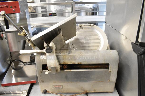 Hobart 1712E Stainless Steel Commercial Countertop Meat Slicer. 115 Volts, 1 Phase. Tested and Does Not Power On - Image 1 of 6