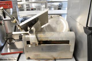 Hobart 1712E Stainless Steel Commercial Countertop Meat Slicer. 115 Volts, 1 Phase. Tested and Does Not Power On - Item #1178810