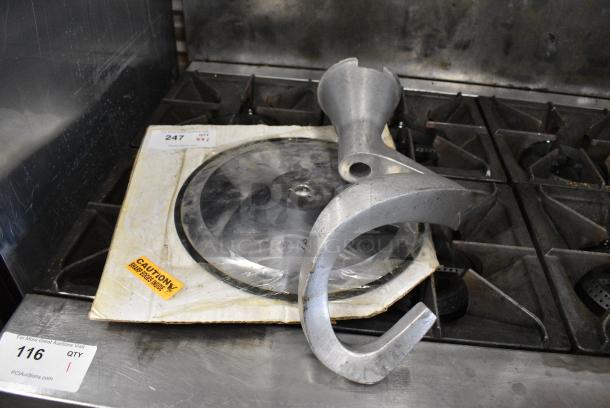 2 Metal Items Including Dough Hook and Meat Slicer Blade. 2 Times Your Bid! - Image 1 of 6
