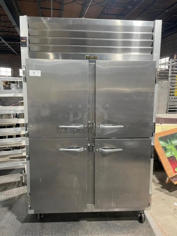 Traulsen Commercial Stainless Steel 2 Section Half Door Reach In Refrigerator! Energy Star Certified! With Poly Coated Wire Racks! Model: G20000 SN: T48193C07! 115V 1 Phase! On Casters! - Image 1 of 8