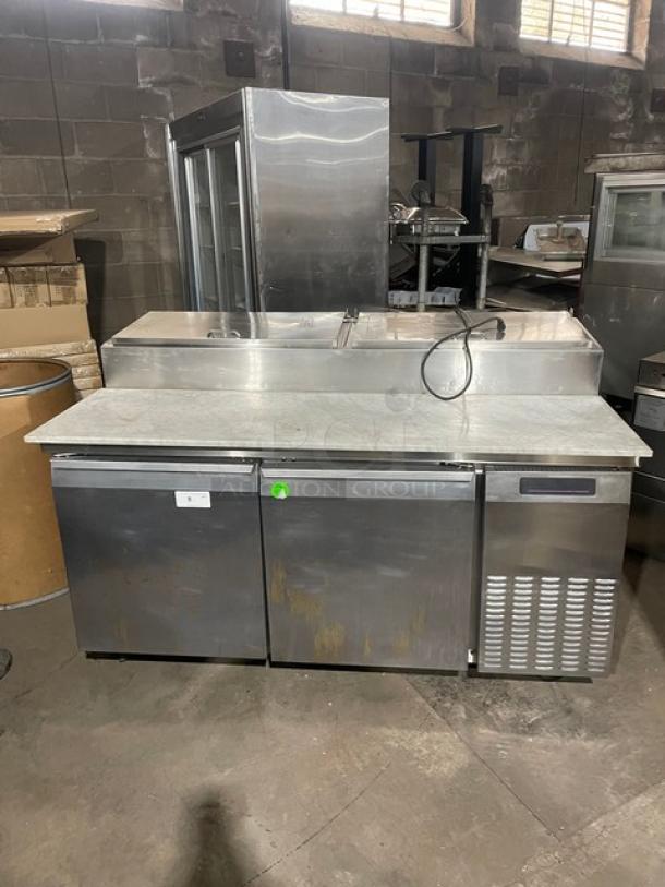 Continental Commercial Stainless Steel 2 Door Refrigerated Bain Marie Mega Top Pizza Prep Table! With Full-Size Removable Marble Style Cutting Board! With Poly Coated Wire Rack! Model: CPT67 SN: 145B2018! 115V 1 Phase! On Casters! Working When Removed! - Image 1 of 9