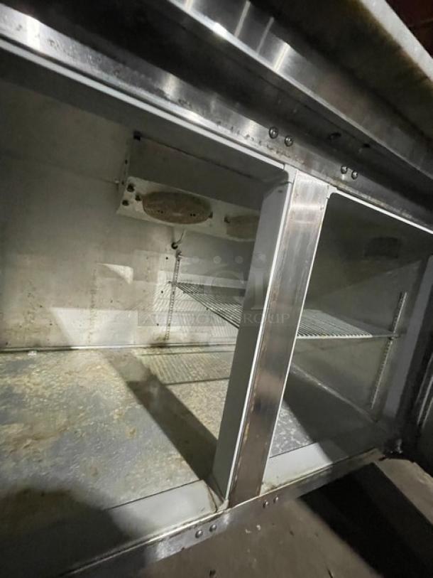 Continental Commercial Stainless Steel 2 Door Refrigerated Bain Marie Mega Top Pizza Prep Table! With Full-Size Removable Marble Style Cutting Board! With Poly Coated Wire Rack! Model: CPT67 SN: 145B2018! 115V 1 Phase! On Casters! Working When Removed! - Image 6 of 9