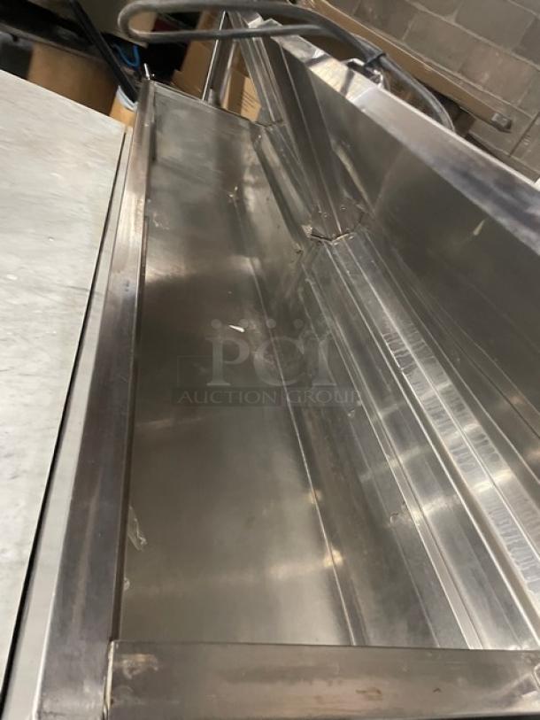 Continental Commercial Stainless Steel 2 Door Refrigerated Bain Marie Mega Top Pizza Prep Table! With Full-Size Removable Marble Style Cutting Board! With Poly Coated Wire Rack! Model: CPT67 SN: 145B2018! 115V 1 Phase! On Casters! Working When Removed! - Image 8 of 9