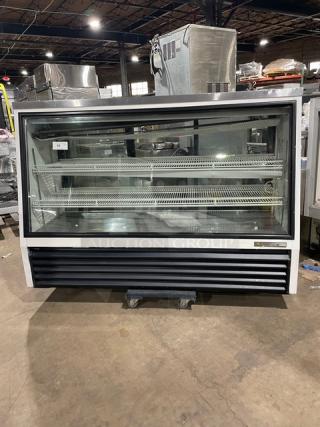True Commercial White Slanted Glass Single Duty Refrigerated Deli Merchandiser Display Showcase! With Stainless Steel Serve-Over Countertop! With Adjustable Poly Coated Wire Shelves! With Rear Double Glass Sliding Doors! Model: TSID-72-3 SN: 8145867! 115V 1 Phase!