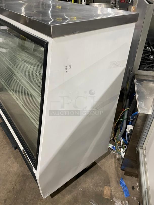 True Commercial White Slanted Glass Single Duty Refrigerated Deli Merchandiser Display Showcase! With Stainless Steel Serve-Over Countertop! With Adjustable Poly Coated Wire Shelves! With Rear Double Glass Sliding Doors! Model: TSID-72-3 SN: 8145867! 115V 1 Phase! - Image 2 of 7
