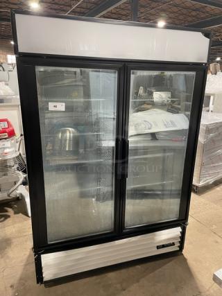 True Commercial White Double Glass Sliding Door Reach In Merchandiser Freezer! With Adjustable Poly Coated Wire Racks! Model: GDM-49F SN: 4954769! 115/208-230V 1 Phase!