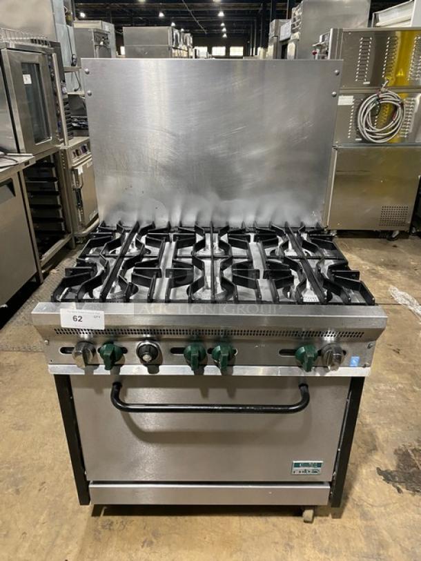 Cub Commercial Stainless Steel Natural Gas Powered 6 Burner Range/Oven Combo! With Back Splash! With Wired Oven Rack! On Casters! - Image 1 of 8