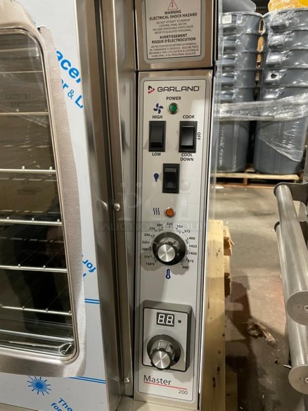 BRAND NEW! Garland Master-200 Series Commercial Stainless Steel Electric Powered Single Stack Convection Oven! With Thermostatic Controls! With Wired Oven Racks! Model: MCO-ES-10S SN: 2212100101287! 208V 1 Phase! With Legs! - Image 9 of 13