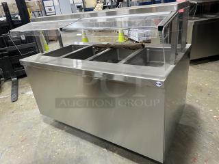 NEW! Delfield Custom Buffet Style Commercial Stainless Steel Electric Powered 60" 4-Well Hot Food Steam Table! With Pan Rail & Individual Controls! With Single Service Flip-Up Sneeze Guard! With Enclosed Base! Model: F14EI460 SN: 2306820101524! 208-230V 1 Phase! On Legs!