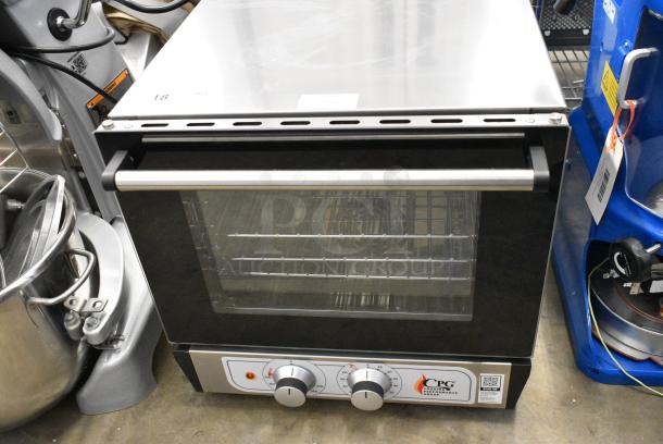 BRAND NEW SCRATCH AND DENT! Cooking Performance Group CPG COQ-T3-A Stainless Steel Commercial Electric Powered Thermostatic Countertop 3 Tray Quarter Size Convection Oven. 120 Volts, 1 Phase. Tested and Working! - Image 1 of 6