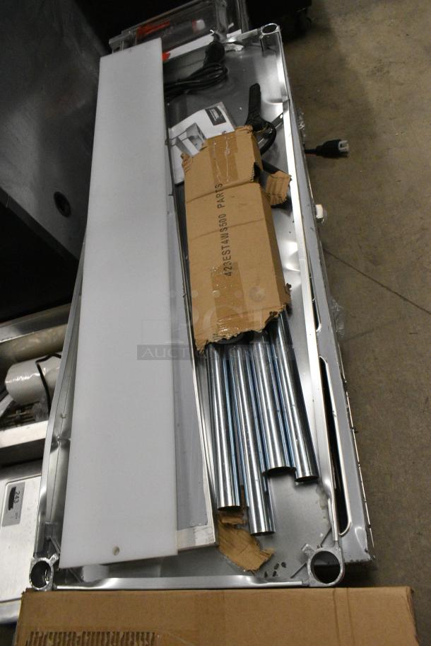 BRAND NEW SCRATCH AND DENT! 2024 ServIt 423EST4WS500 Stainless Steel Commercial Four Pan Sealed Well Electric Steam Table with Adjustable Undershelf. 120 Volts, 1 Phase. Cannot Test Due To Plug Style - Image 4 of 10