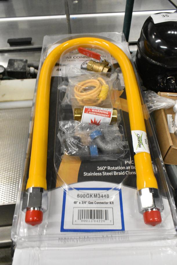 BRAND NEW SCRATCH AND DENT! Regency 600GKM3448 48" Mobile Gas Connector Hose Kit with 2 Elbows, Full Port Valve, Restraining Device, and Quick Disconnect - 3/4" - Image 1 of 3