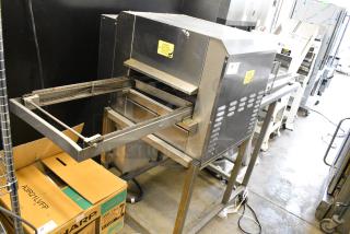 Belshaw Adamatic TG50 Stainless Steel Commercial Floor Style Thermoglaze Icing Machine on Commercial Casters. 208 Volts, 1 Phase.