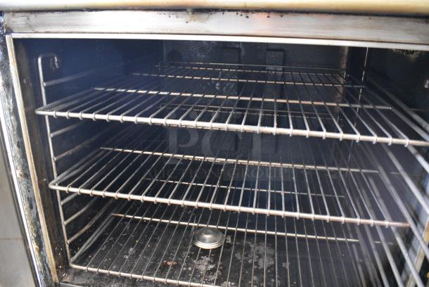 Montague Stainless Steel Commercial Natural Gas Powered Full Size Convection Oven w/ View Through Doors, Metal Oven Racks and Thermostatic Controls. - Image 3 of 7