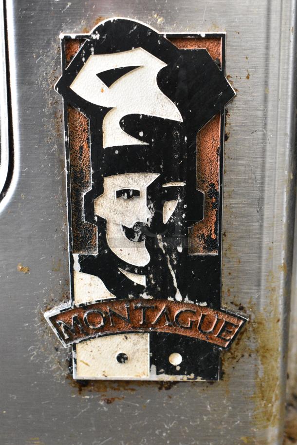 Montague Stainless Steel Commercial Natural Gas Powered Full Size Convection Oven w/ View Through Doors, Metal Oven Racks and Thermostatic Controls on Commercial Casters. - Image 5 of 8