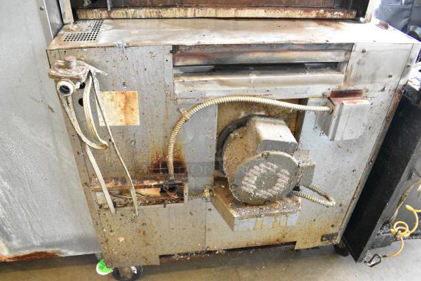 Montague Stainless Steel Commercial Natural Gas Powered Full Size Convection Oven w/ View Through Doors, Metal Oven Racks and Thermostatic Controls on Commercial Casters. - Image 6 of 8