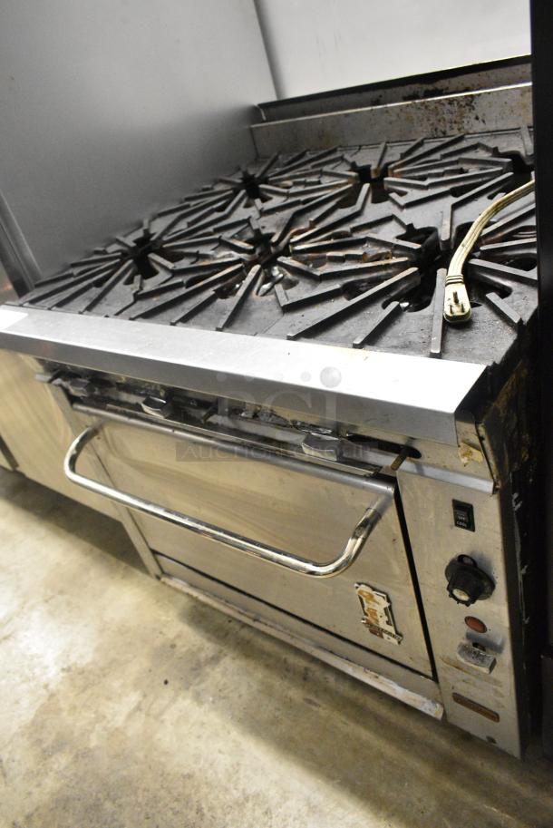 Montague Stainless Steel Commercial Natural Gas Powered 6 Burner Range w/ CONVECTION Oven. - Image 1 of 11