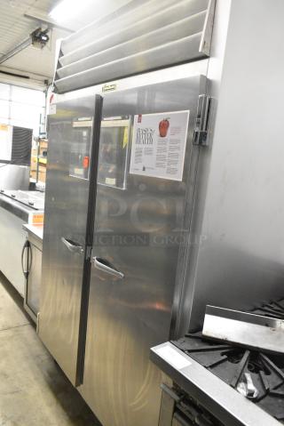 Traulsen G20010 Stainless Steel Commercial 2 Door Reach In Cooler on Commercial Casters. 115 Volts, 1 Phase. Tested and Working!