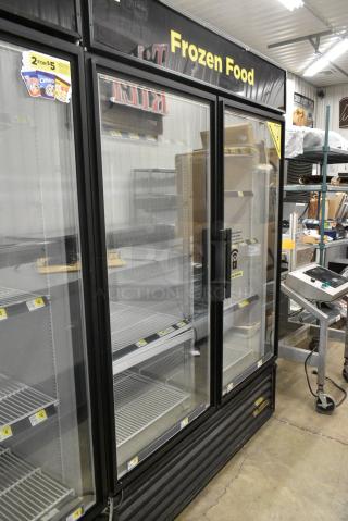 True GDM-49F-LD Metal Commercial 2 Door Reach In Freezer Merchandiser w/ Poly Coated Racks. 115/208-230 Volts, 1 Phase. Tested and Working!