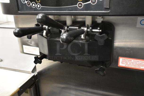 Taylor C713-33 Stainless Steel Commercial Floor Style Water Cooled 2 Flavor w/ Twist Soft Serve Ice Cream Machine on Commercial Casters. 208-230 Volts, 3 Phase. - Image 4 of 11