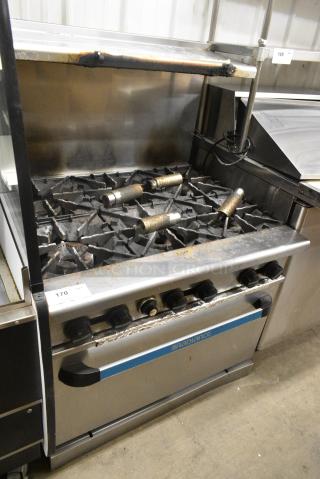Radiance Stainless Steel Commercial Natural Gas Powered 6 Burner Range w/ Oven, Back Splash and Over Shelf.