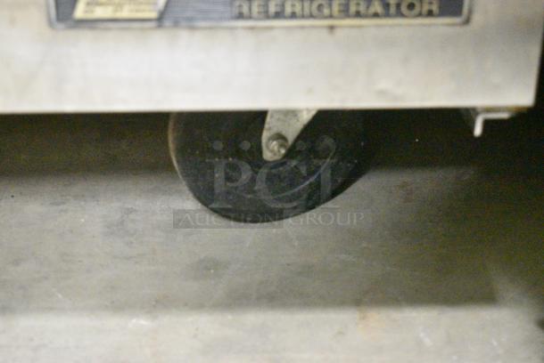 True TSSU-48-18M-B Stainless Steel Commercial Sandwich Salad Prep Table Bain Marie on Commercial Casters. 115 Volts, 1 Phase. Tested and Powers On But Does Not Get Cold - Image 4 of 9