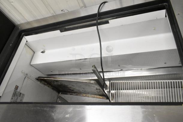 True TSSU-48-18M-B Stainless Steel Commercial Sandwich Salad Prep Table Bain Marie on Commercial Casters. 115 Volts, 1 Phase. Tested and Powers On But Does Not Get Cold - Image 5 of 9