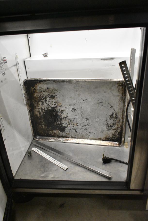 True TSSU-48-18M-B Stainless Steel Commercial Sandwich Salad Prep Table Bain Marie on Commercial Casters. 115 Volts, 1 Phase. Tested and Powers On But Does Not Get Cold - Image 6 of 9