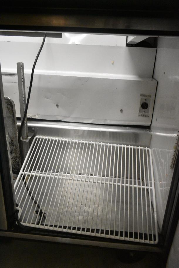 True TSSU-48-18M-B Stainless Steel Commercial Sandwich Salad Prep Table Bain Marie on Commercial Casters. 115 Volts, 1 Phase. Tested and Powers On But Does Not Get Cold - Image 7 of 9