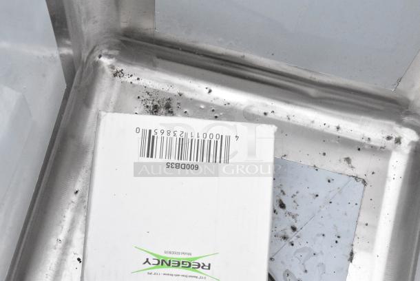 BRAND NEW SCRATCH AND DENT! Regency 600S31014 39" 16-Gauge Stainless Steel Three Compartment Commercial Sink with Galvanized Steel Legs and without Drainboards - 10" x 14" x 12" Bowls. No Legs. - Image 6 of 7