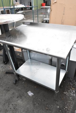 Stainless Steel Commercial Table w/ Metal Under Shelf.