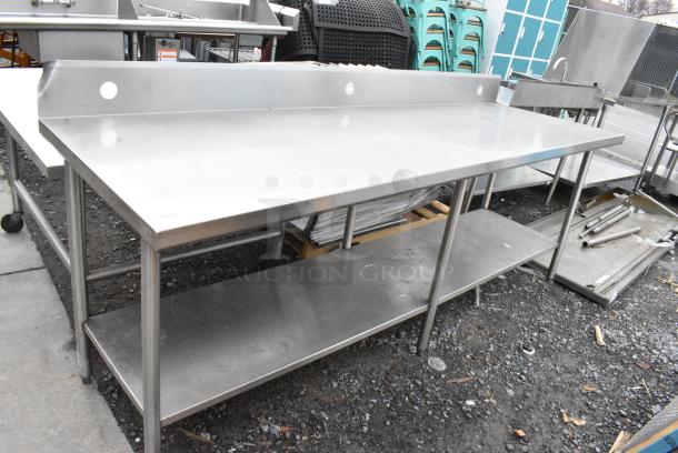 Stainless Steel Table w/ Back Splash and Under Shelf. - Image 1 of 4