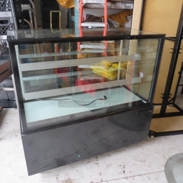 One WORKING Spartan Refrigerated Display Case With 2 Shelves On Casters. Model# SCC-48.  110-120 Volt. 48X27X47. $4627.00. - Image 1 of 3
