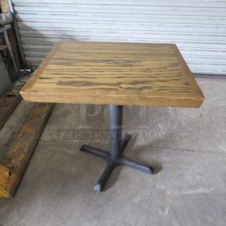 One Wooden Table Top On A Pedestal Base. 24X28X29