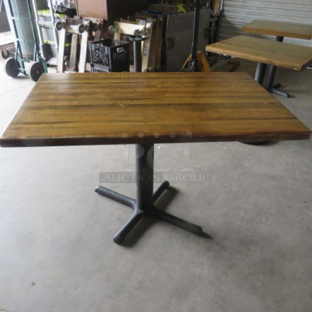 One Wooden Butcher Block Table Top On  Pedestal Base. 48X30X30 - Image 1 of 2