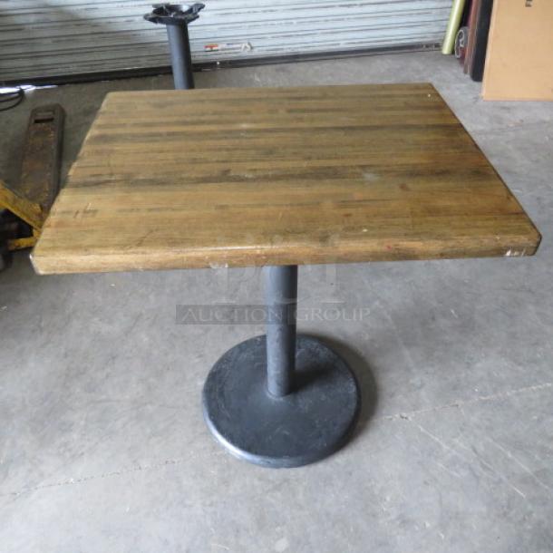 One Wooden Butcher Block Table Top On A Pedestal Base. 24X30X30 - Image 1 of 2
