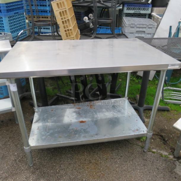 One Stainless Steel Table With Under Shelf. #TG-836.  48X30X36 - Image 1 of 1
