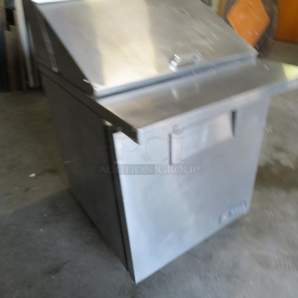 One WORKING True 1 Door Refrigerated Prep Table On Casters. Model# TSSU-27-12M-B. 115 Volt. 27.5X34X44. $3088.00. - Image 2 of 4