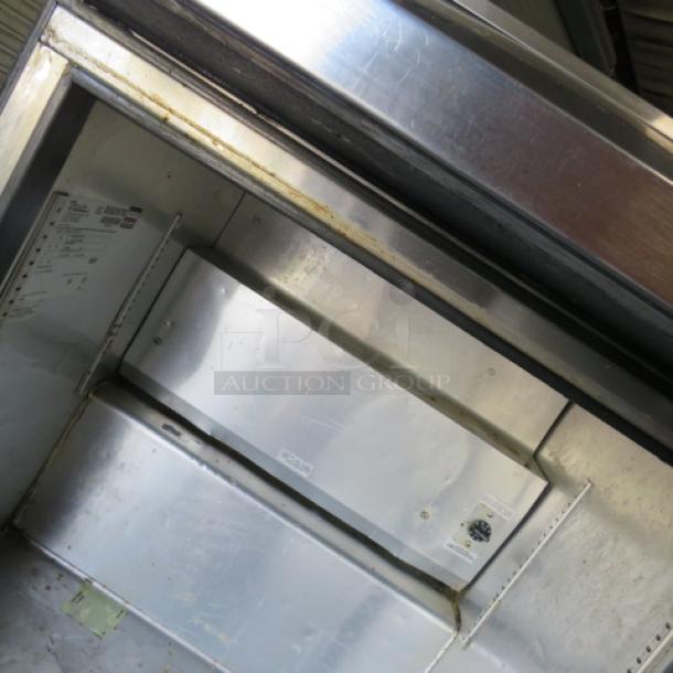 One WORKING True 1 Door Refrigerated Prep Table On Casters. Model# TSSU-27-12M-B. 115 Volt. 27.5X34X44. $3088.00. - Image 4 of 4