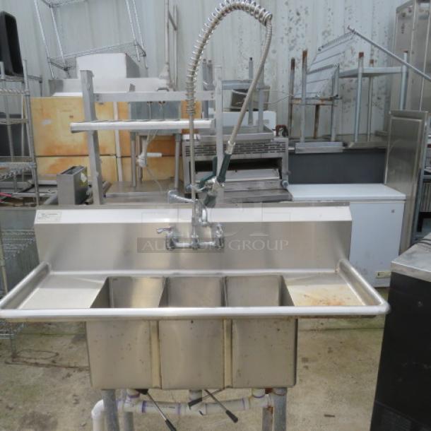 One Jimex 3 Compartment Sink With R/L Drain Boards, Faucet And Hose Sprayer. 54X21X46.5. - Image 1 of 2