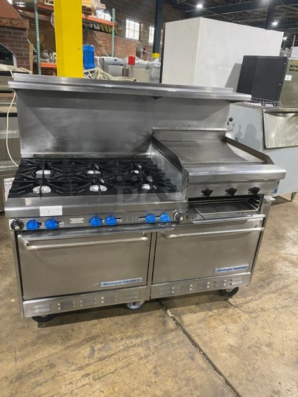 Montague Grizzly Series Commercial Stainless Steel Natural Gas Powered 6 Burner Range/Raised Flat Griddle Split Top & Double Oven Combo! With Built-In Broiler/Cheese Melter! With Back Splash & Overhead Salamander Shelf! With Wired Oven Racks! On Casters! - Image 1 of 11