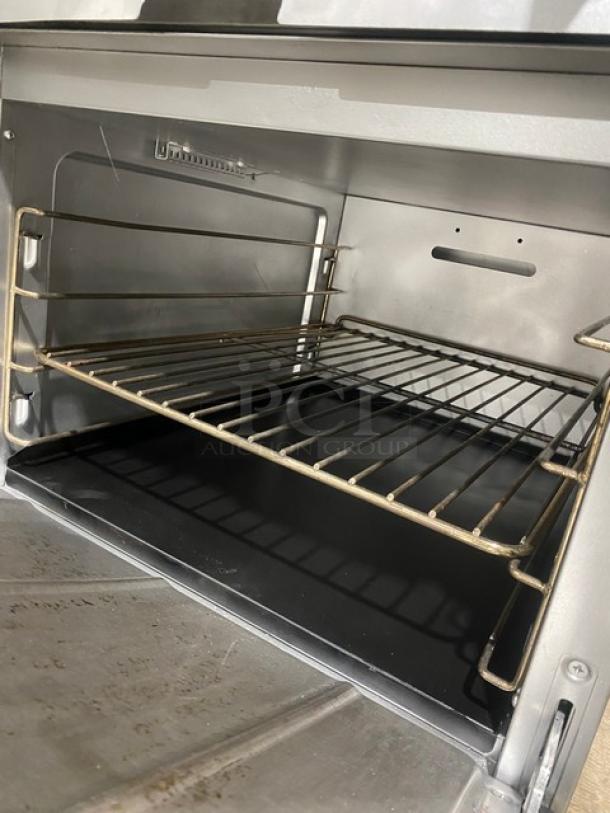 CPG Commercial Stainless Steel Natural Gas Powered 4 Burner Range/Oven Combo! With Back Splash & Overhead Salamander Shelf! With Wired Oven Rack! Model: 351S24N SN: 12217160! On Casters! - Image 7 of 10