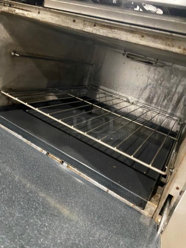 Southbend Commercial Stainless Steel Natural Gas Powered 4 Burner Range/Flat Griddle Split Top & Oven Combo! With Back Splash! With Wire Oven Rack! Model: X336D-1GL SN: 04C65469! On Casters! Working When Removed! - Image 8 of 11